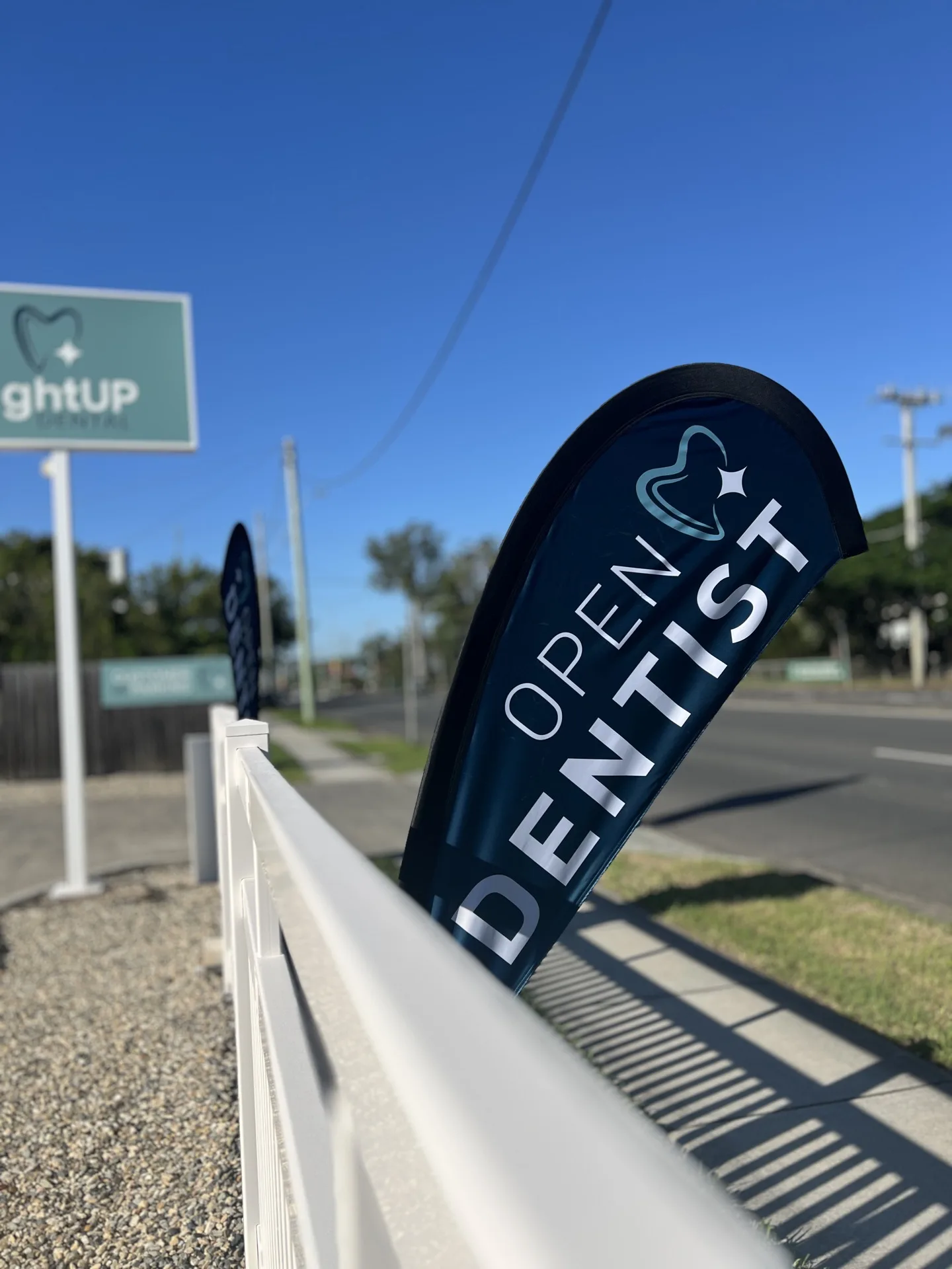 LightUP Dental open dentist flag outside the clinic