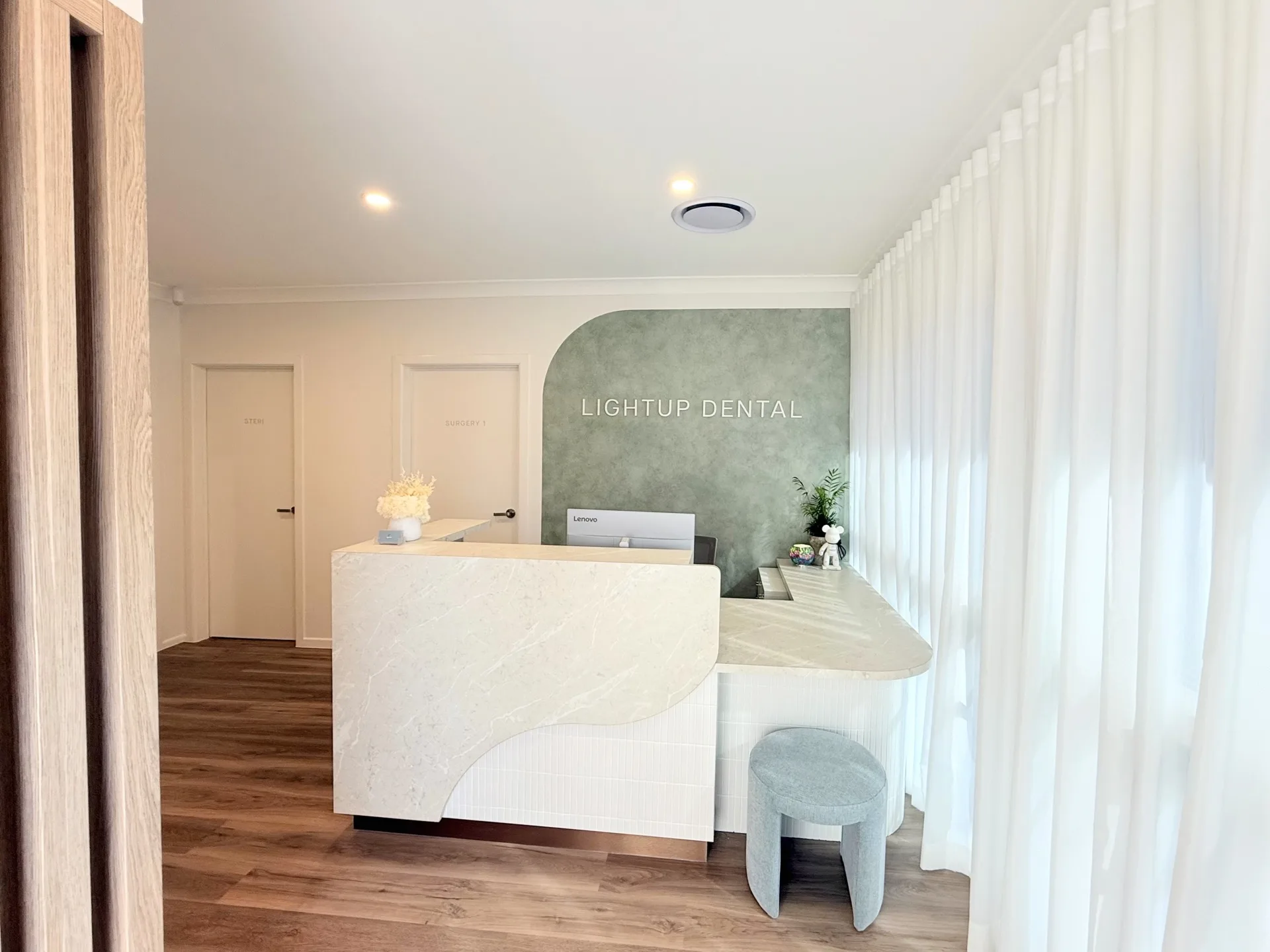 LightUP Dental reception desk with signage wall